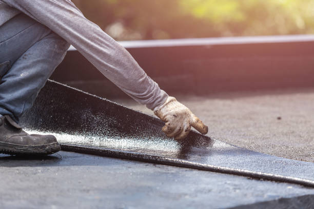 Professional Basement Waterproofing technician working in Rodney, MI
